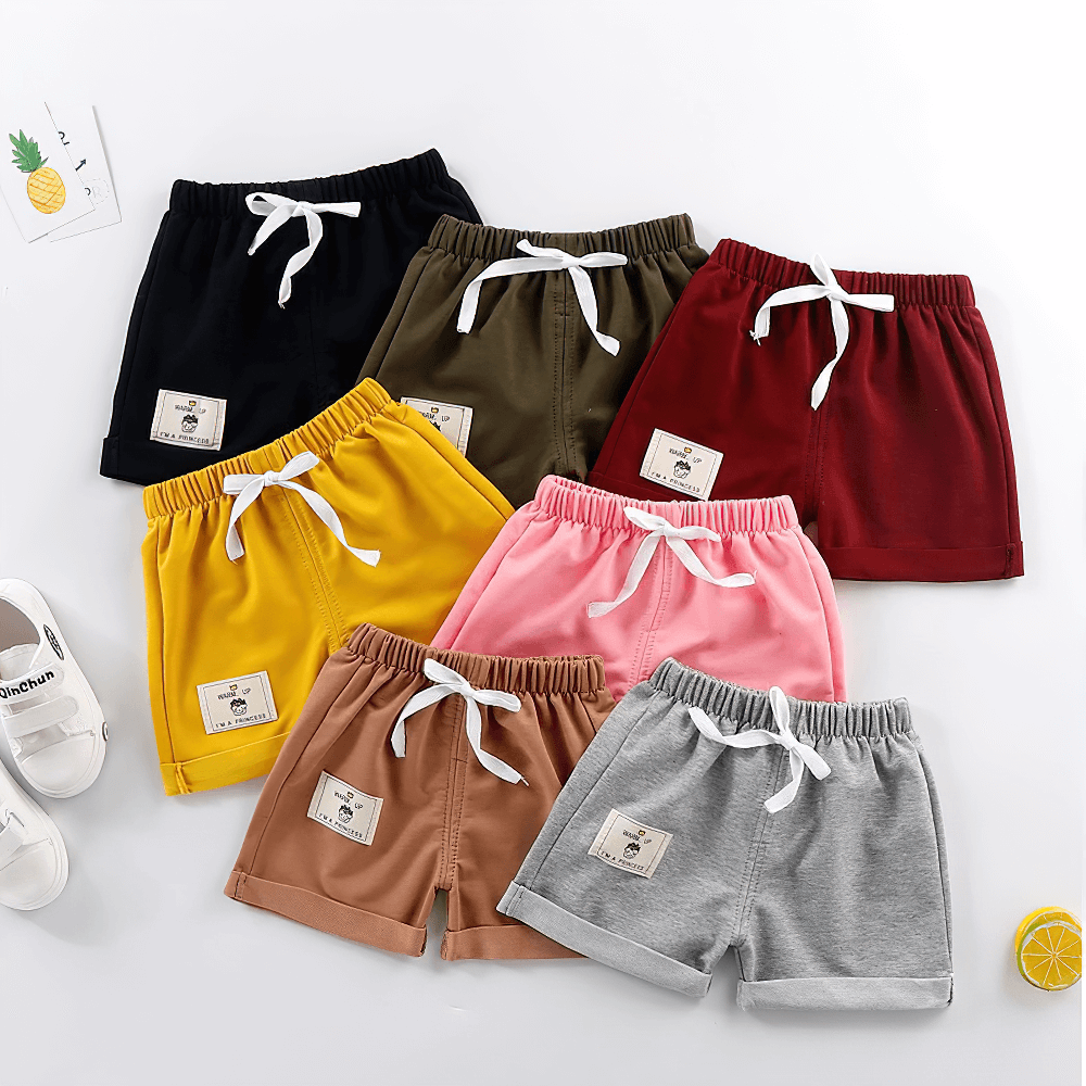 Colorful toddler Cotton Shorts with Patch Detail and Pockets - SF3806, featuring elastic waistband, drawstring, and folded hem design.