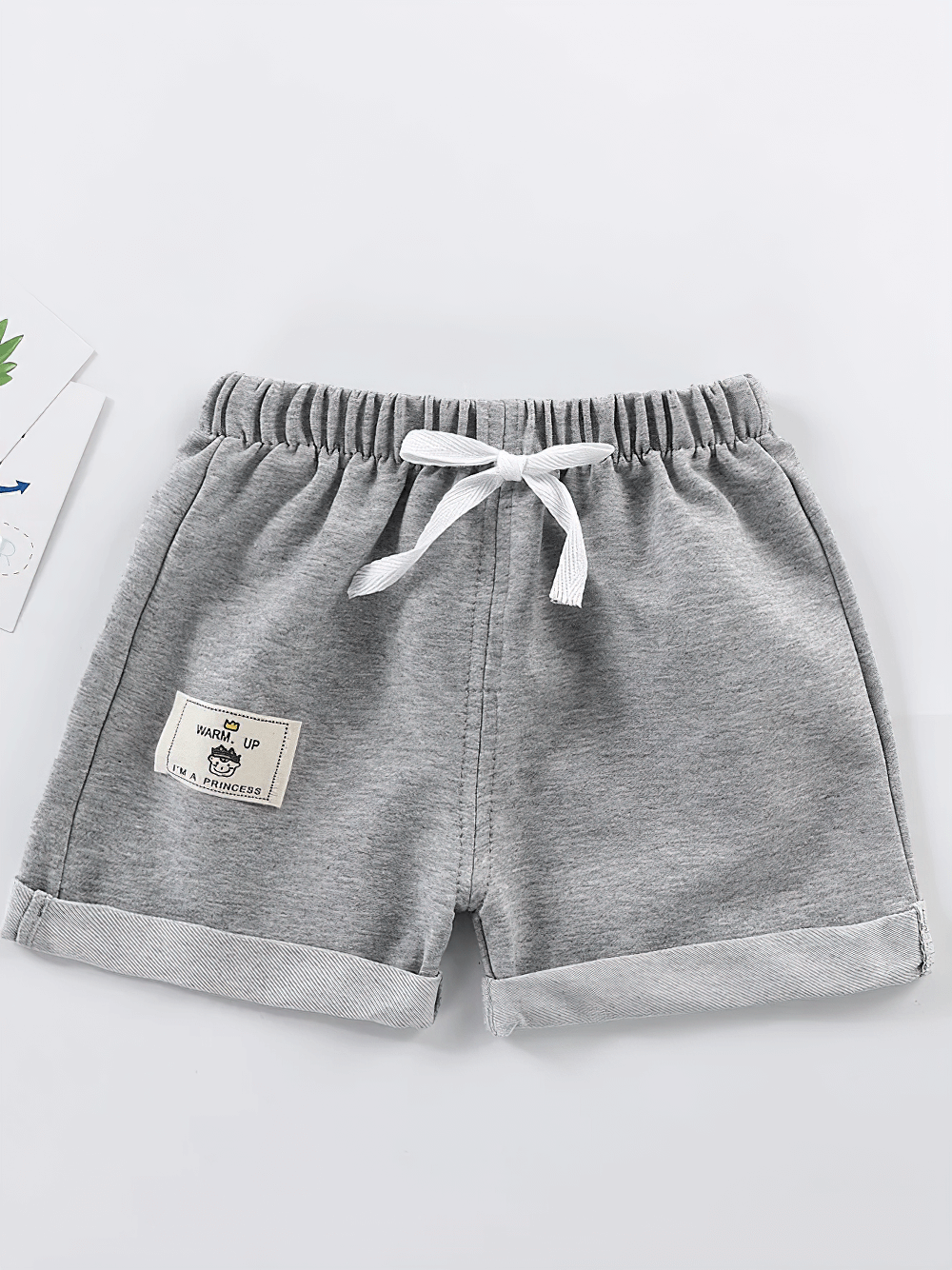 Cotton Shorts with Patch Detail and Pockets - SF3806 for toddlers, featuring elastic waistband, drawstring, and folded hem design.