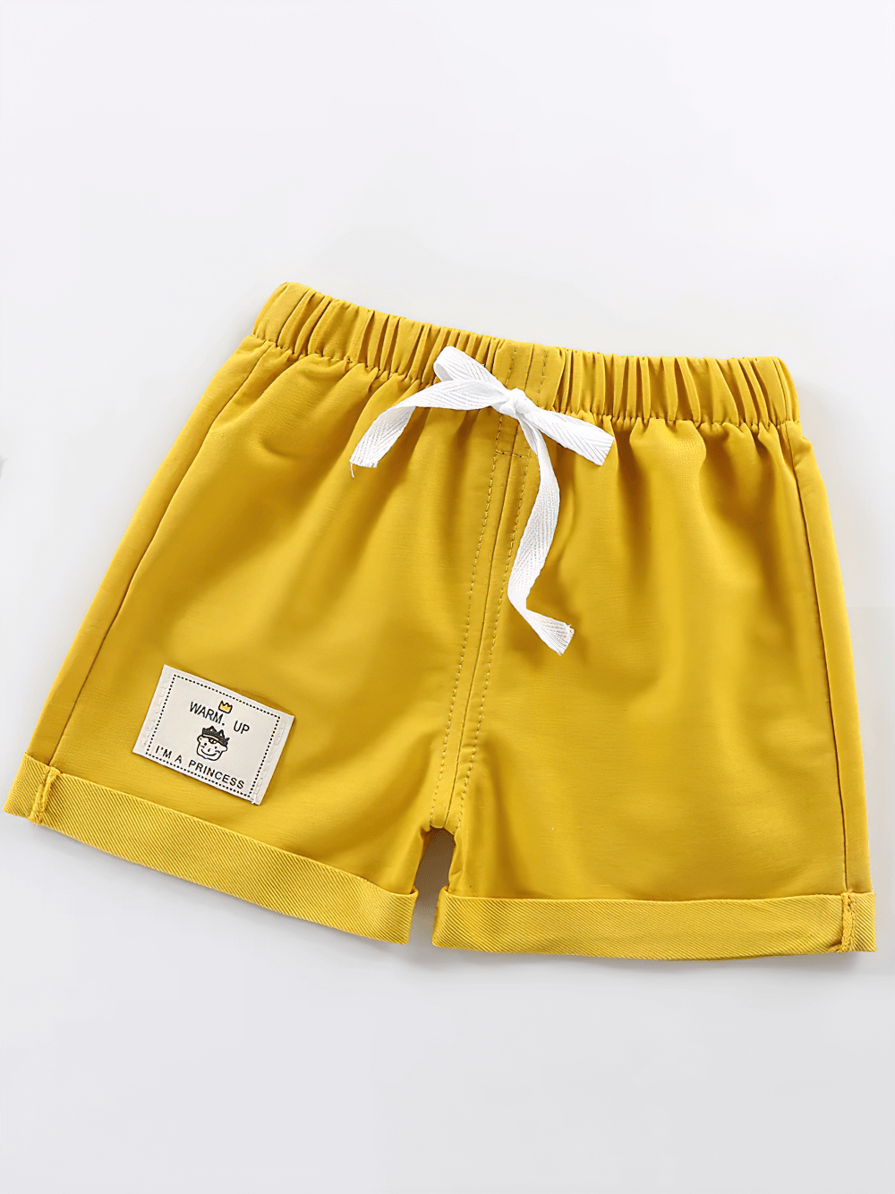 Cotton Shorts with Patch Detail and Pockets - SF3806, featuring folded hems, elastic waistband, and fun patch. Perfect for toddler playtime.