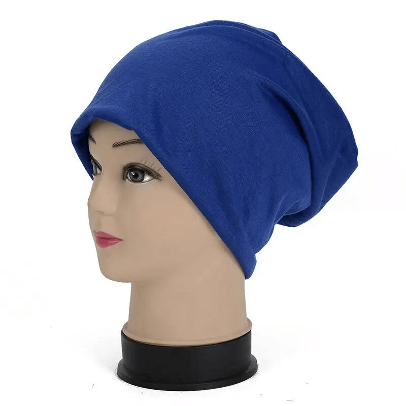 Royal blue cotton soft slouchy beanie for running on mannequin, unisex lightweight casual style, ideal for outdoor activities.