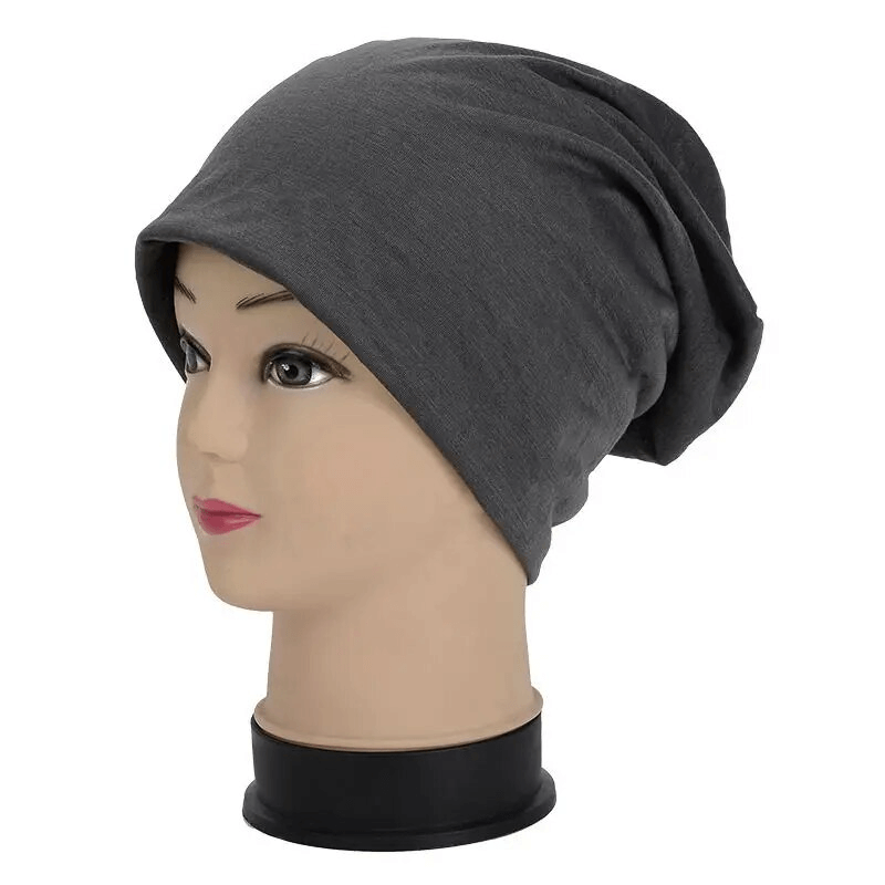 Cotton soft lightweight slouchy beanie in grey for running, displayed on mannequin head. Unisex casual style for outdoor activities.