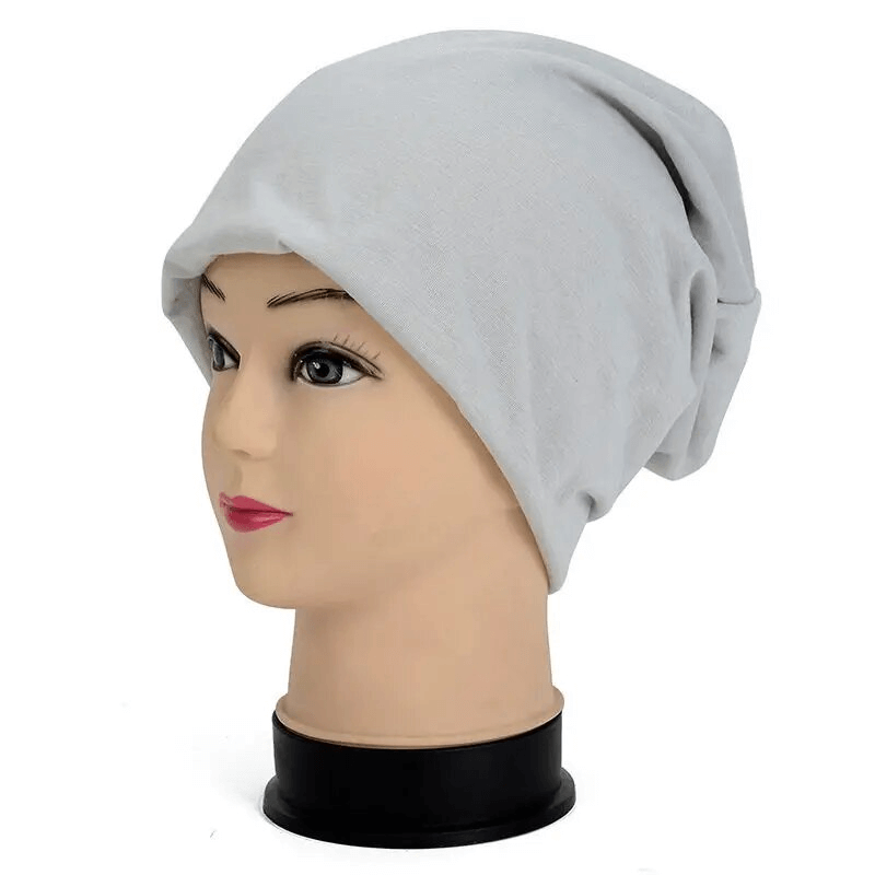 Unisex cotton soft lightweight slouchy beanie for running, displayed on a mannequin head, perfect for casual outdoor activities.