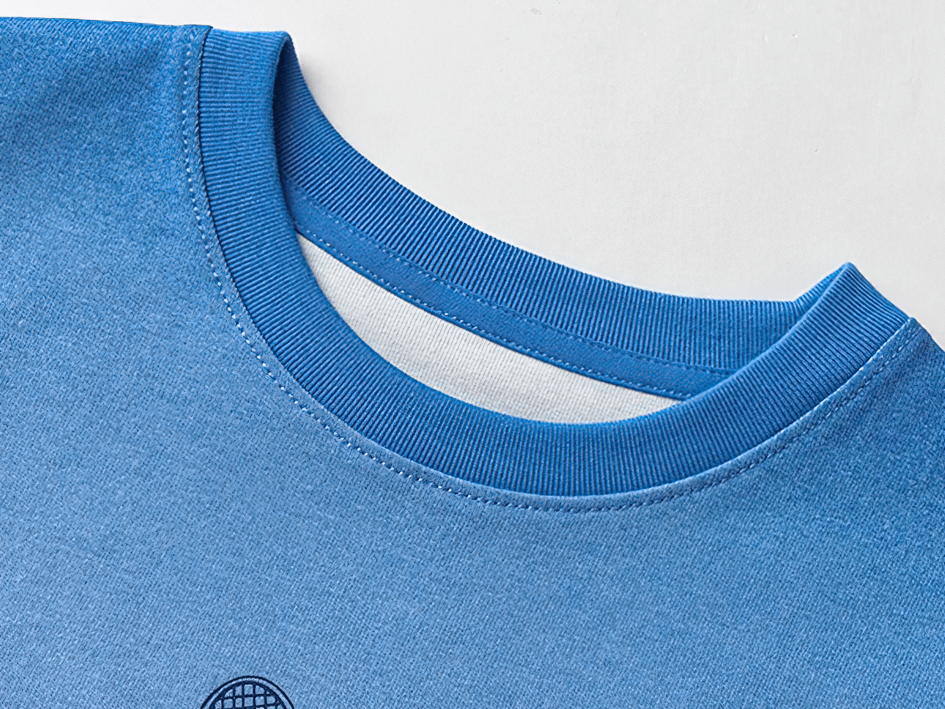 Close-up of blue neckline on children's breathable tank top SF3684 with tie-dye design, showcasing quality cotton fabric for comfort.