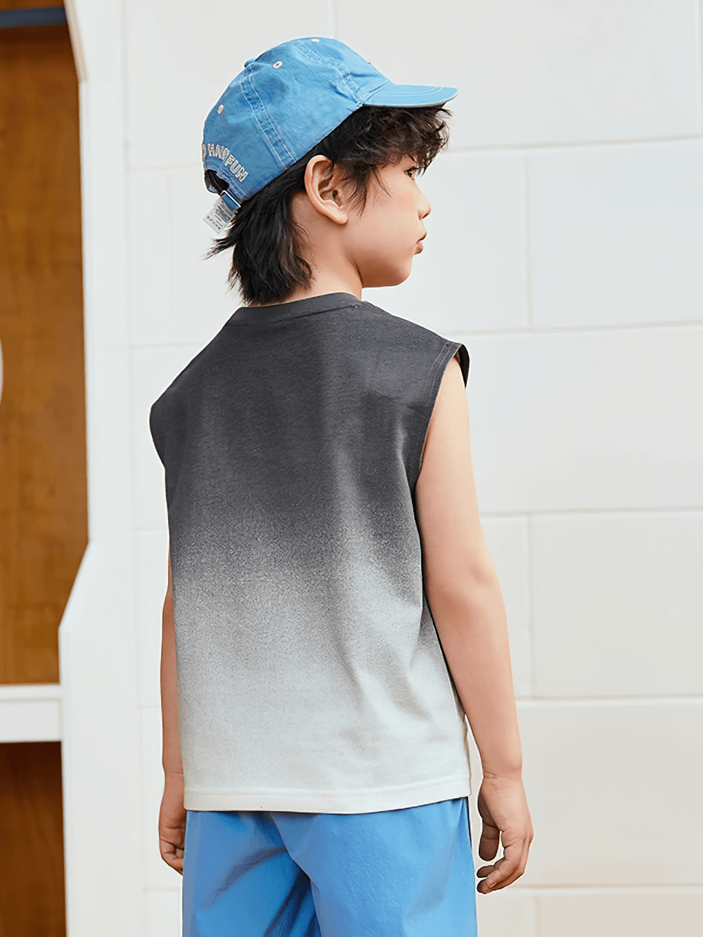 Back view of boy wearing Cotton Tank Top with Tie-Dye Gradient Design - SF3684 and blue cap