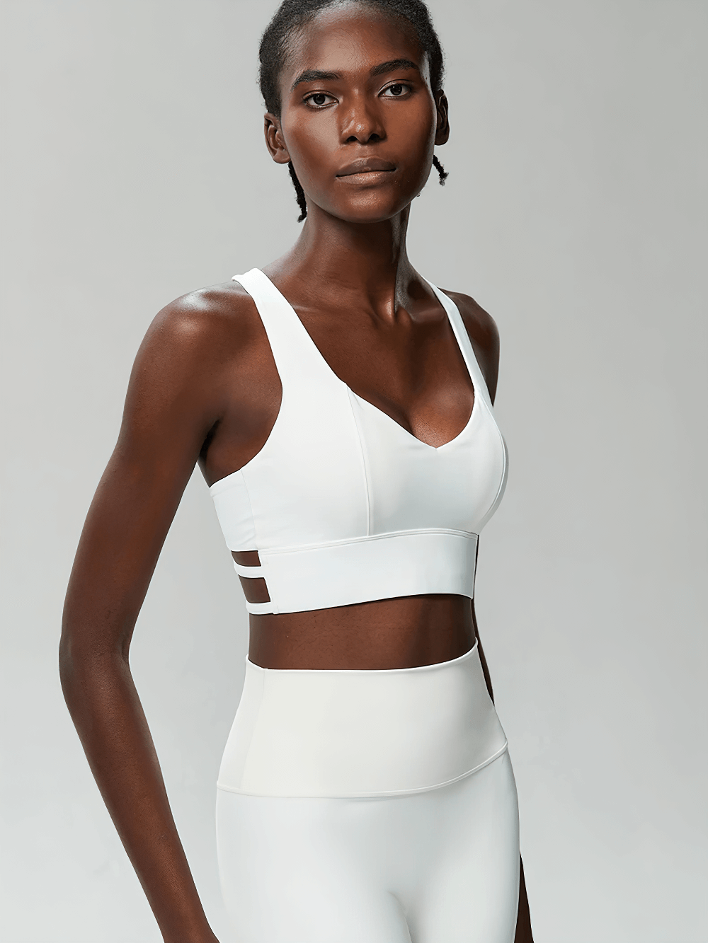 Woman wearing Crisscross Back Sports Bra with Removable Pads - SF4040 for yoga and gym