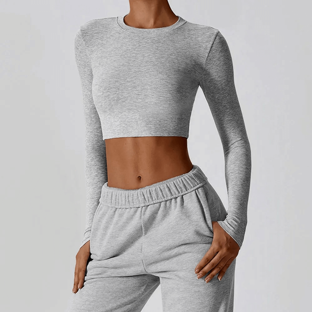 Cropped solid color women's long sleeves top for yoga, breathable and quick-drying, anti-pilling for a fresh look.