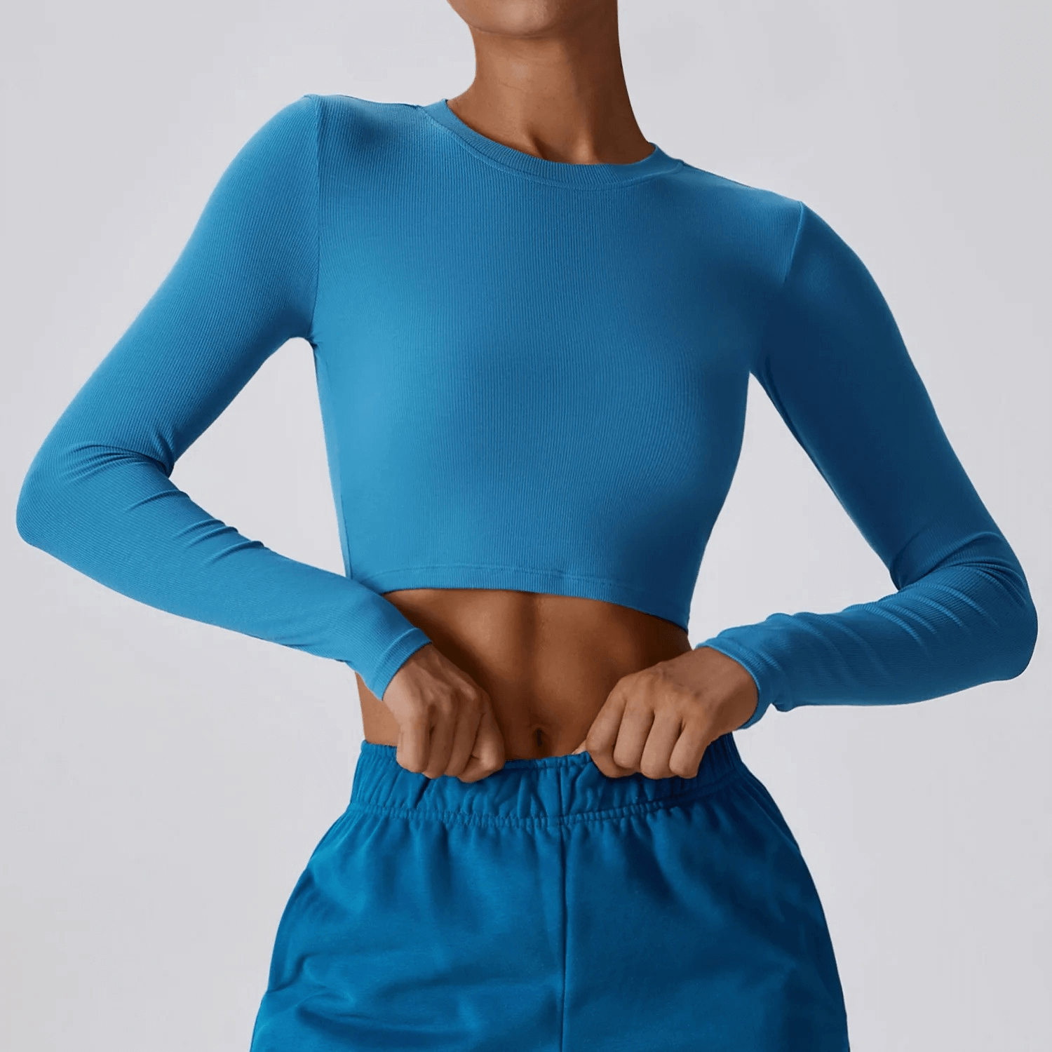 Blue cropped long sleeves top for women, perfect for yoga, made of breathable cotton with anti-pilling treatment, style SF1791.