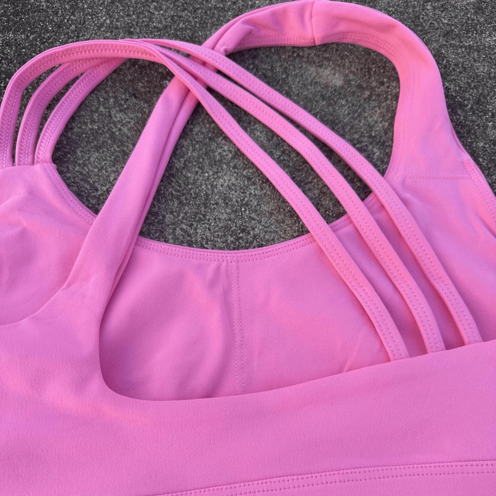 Alt Tag: Cross Back Yoga Bra and High Waist Gym Shorts Set - SF4355 pink cross-back high-impact sports bra close-up, supportive straps