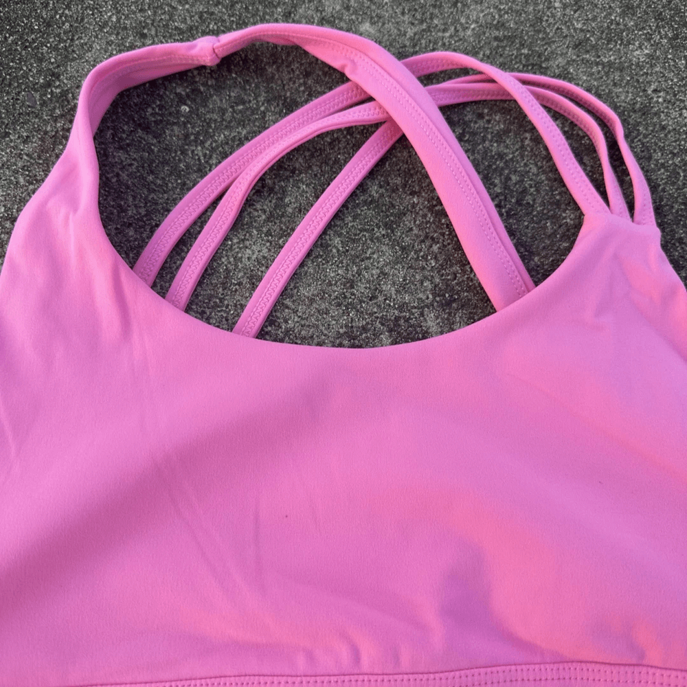Alt Tag: Cross Back Yoga Bra and High Waist Gym Shorts Set - SF4355 pink cross-back high impact sports bra top close-up