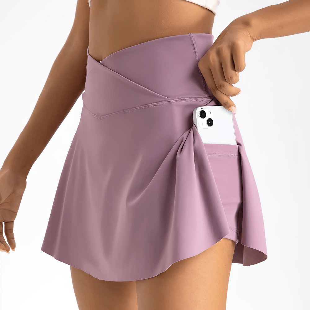 Alt Tag: Crossover High Waist Golf Skirt with Pocket - SF4439 mauve pleated tennis skort with side pocket and built-in shorts