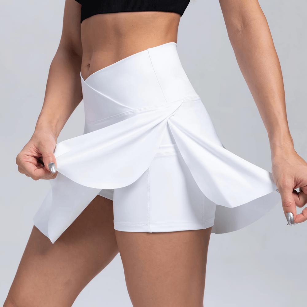 Alt Tag: Crossover High Waist Golf Skirt with Pocket - SF4439 white pleated tennis skort with inner shorts and side pocket, stretchy flowy fit