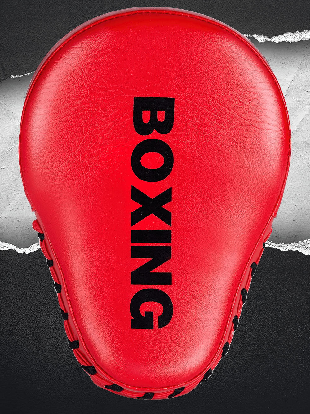 Curved red boxing focus pad for MMA and kickboxing with black "Boxing" text, durable PU leather suitable for training and sparring.