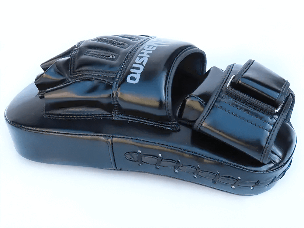 Curved PU leather focus pad for boxing with sturdy stitching, ideal for precision training in kickboxing and MMA, model SF3149.