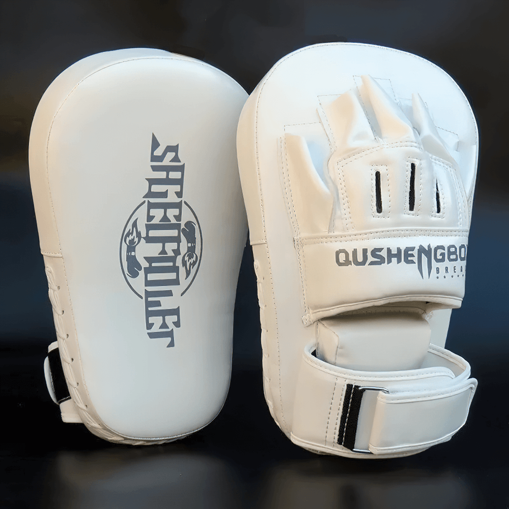 Curved PU leather focus pads for boxing training, dense padding, hand-shaped mold, reinforced stitching, ideal for MMA and kickboxing.