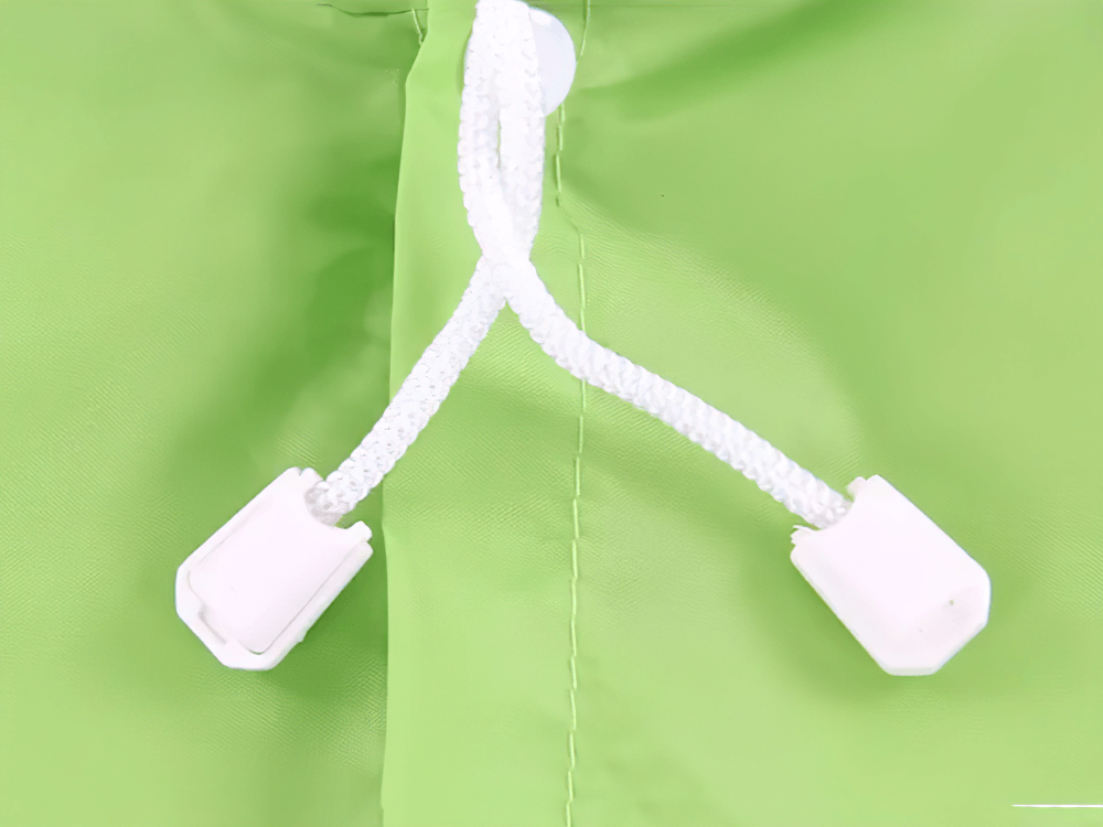 Close-up of adjustable hood on Cute Animal Hooded Waterproof Raincoat with Pockets - SF3616 in green, showcasing waterproof design for kids.