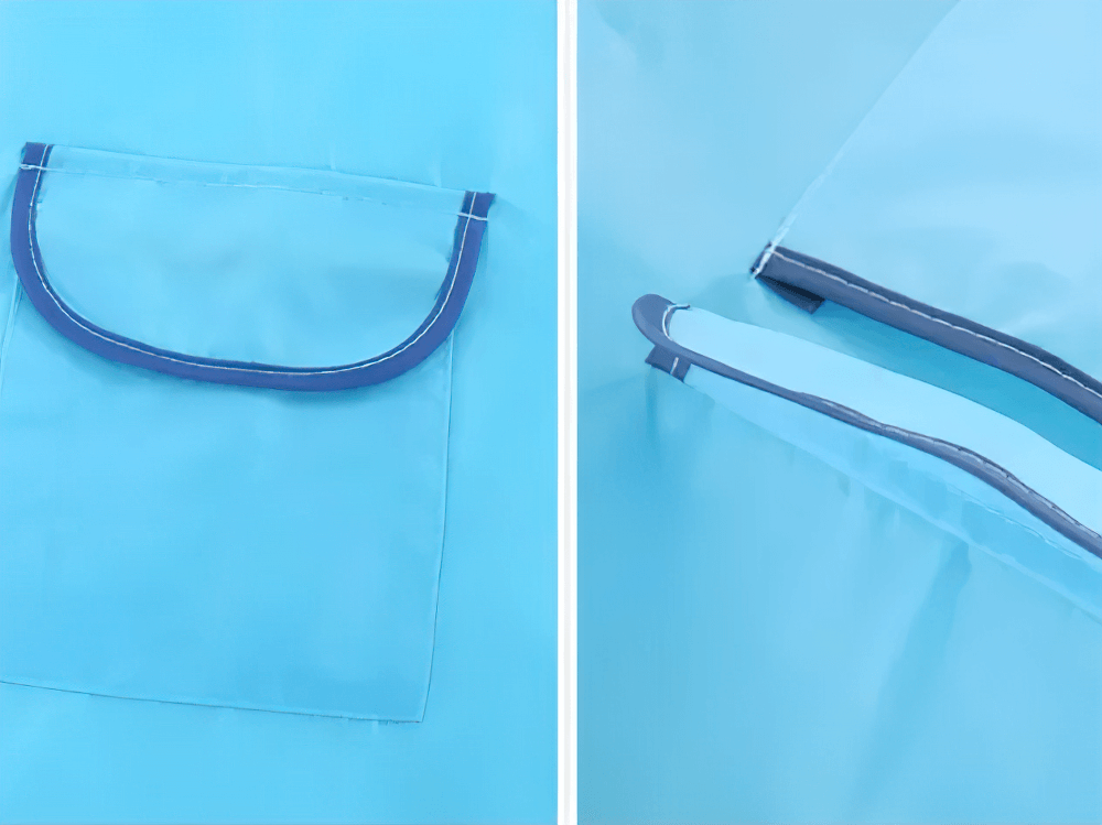 Close-up of blue pocket and seam on Cute Animal Hooded Waterproof Raincoat with Pockets - SF3616, highlighting waterproof material.