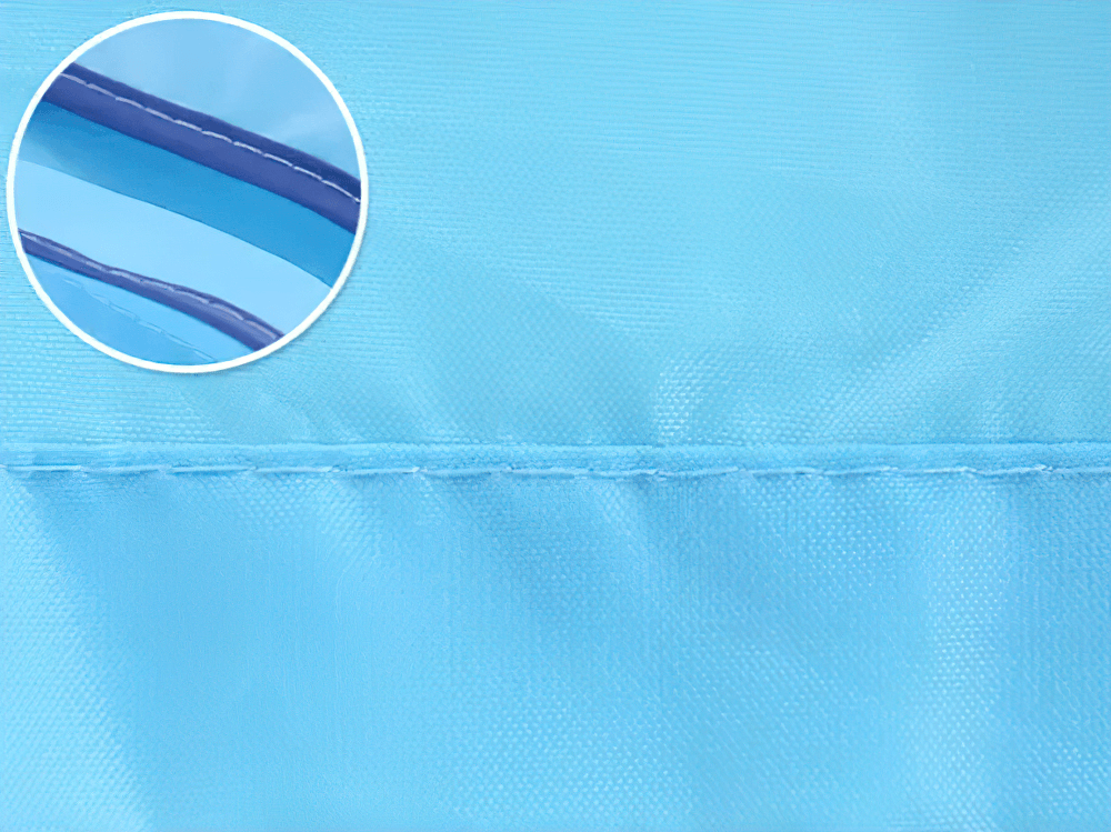 Close-up of stitching on Cute Animal Hooded Waterproof Raincoat with Pockets - SF3616, highlighting quality waterproof material in blue.