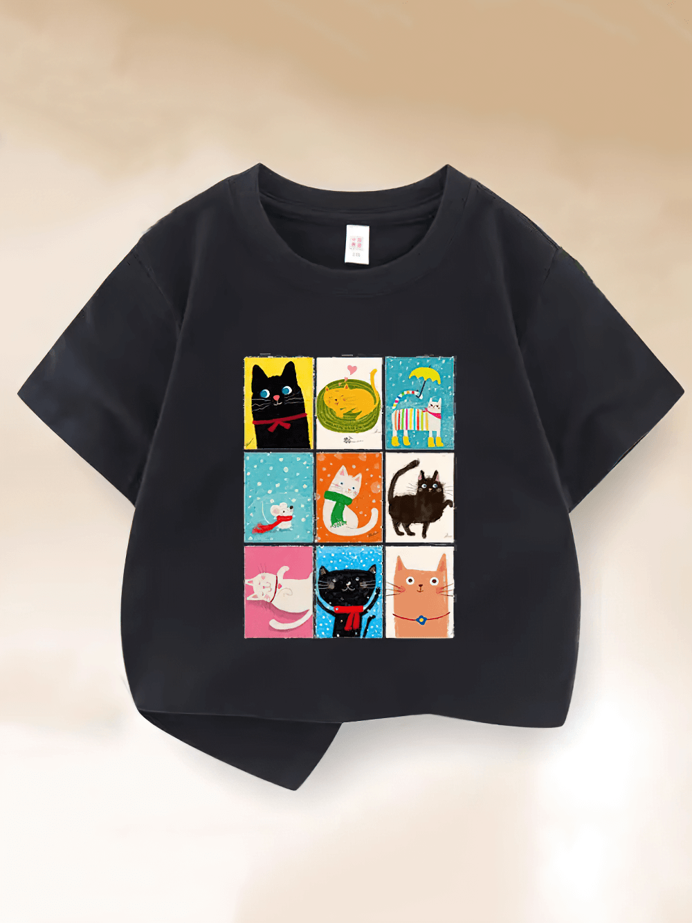Cute Cat Squares Kids' Graphic Tee with colorful cat illustrations, perfect for animal-loving toddlers, on soft, breathable fabric.