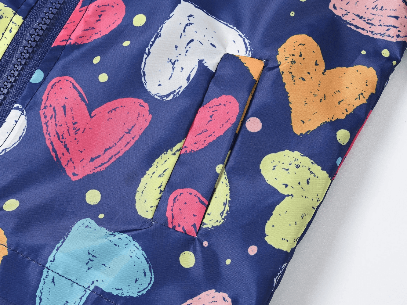 Colorful heart prints on Cute Printed Hooded Windbreaker Jacket - SF3594 for kids, perfect for playful outdoor adventures.
