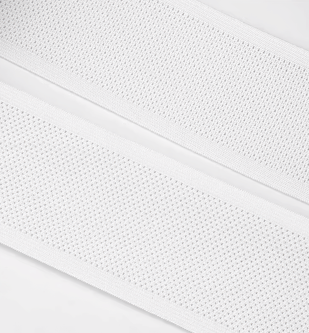 Close-up of breathable mesh fabric on cycling bib shorts straps for enhanced support.