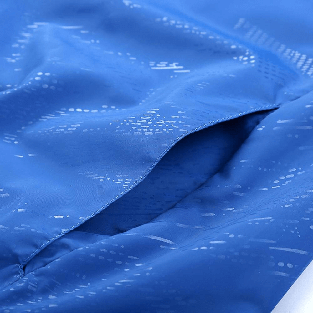 Close-up of blue cycling men's reflective quick-dry windbreaker fabric showing texture and weave, featuring subtle patterns.