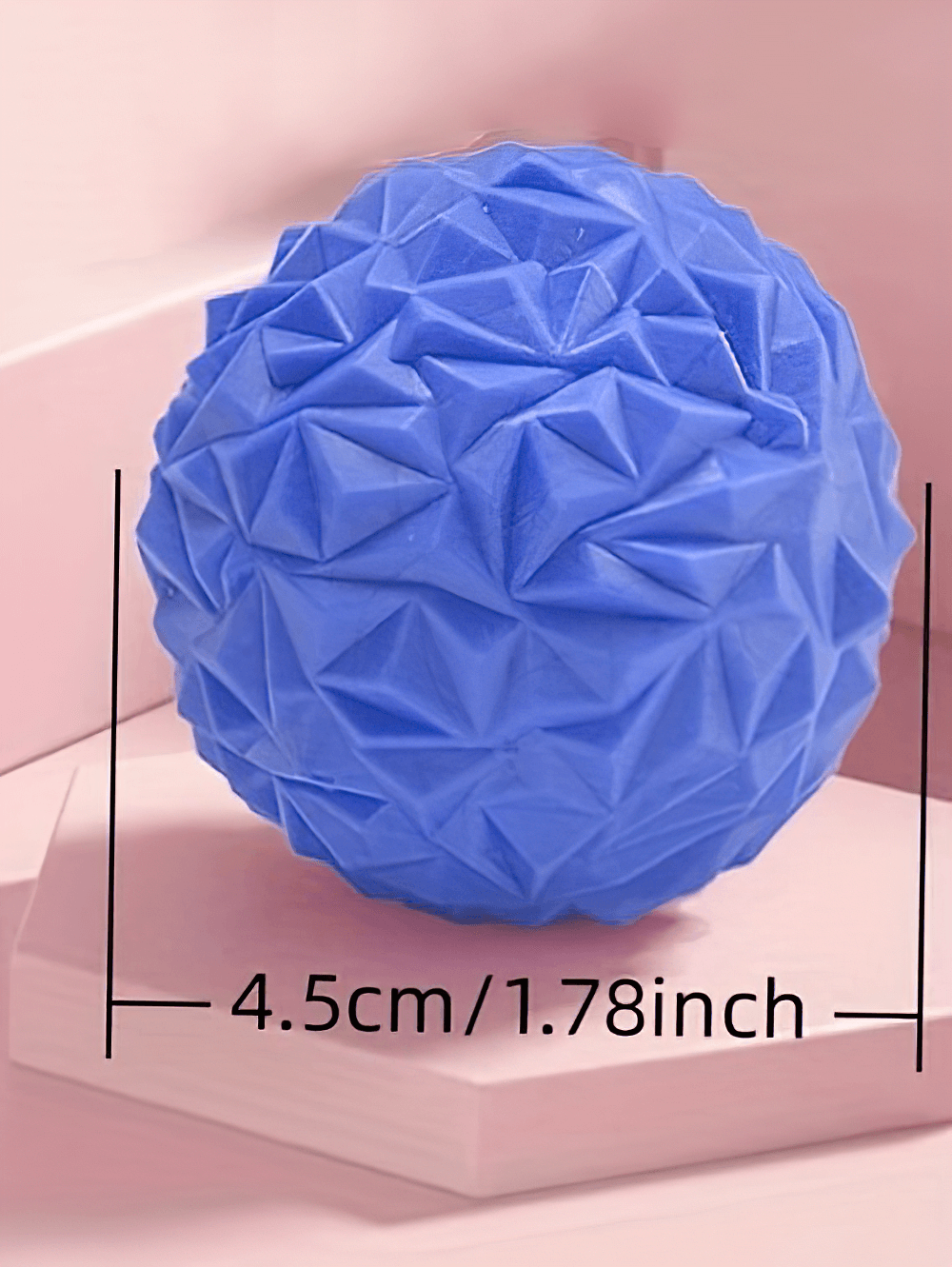 Blue textured deep tissue massage ball for foot and muscle relief, 4.5cm diameter, ideal for reflexology and myofascial release.