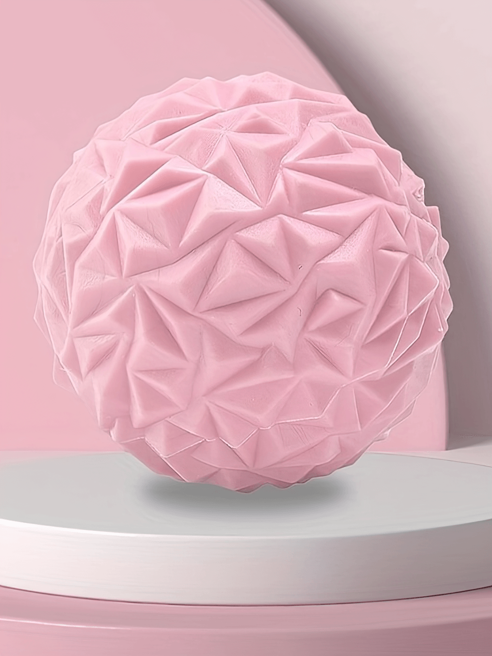 Pink textured massage ball for deep tissue relief, perfect for reflexology and myofascial release. Ideal for home, gym, or travel.