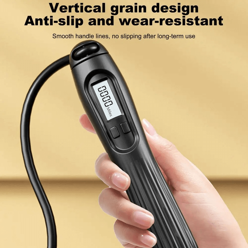 Close-up of a person holding an anti-slip digital jump rope with adjustable length and built-in counter, ideal for fitness tracking.