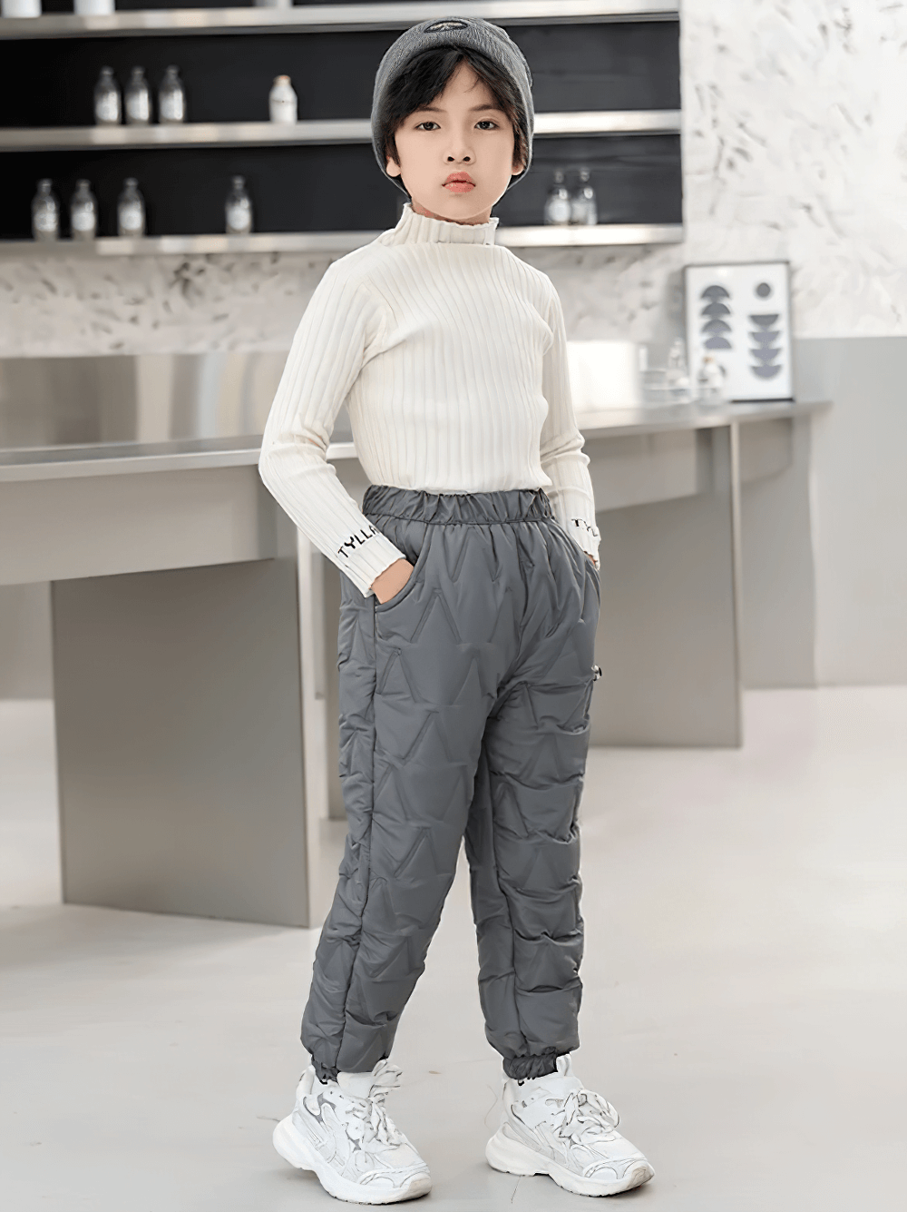 Child wearing Down Pants Warm Padded Ski and Snow Trousers - SF3733 for winter adventures.