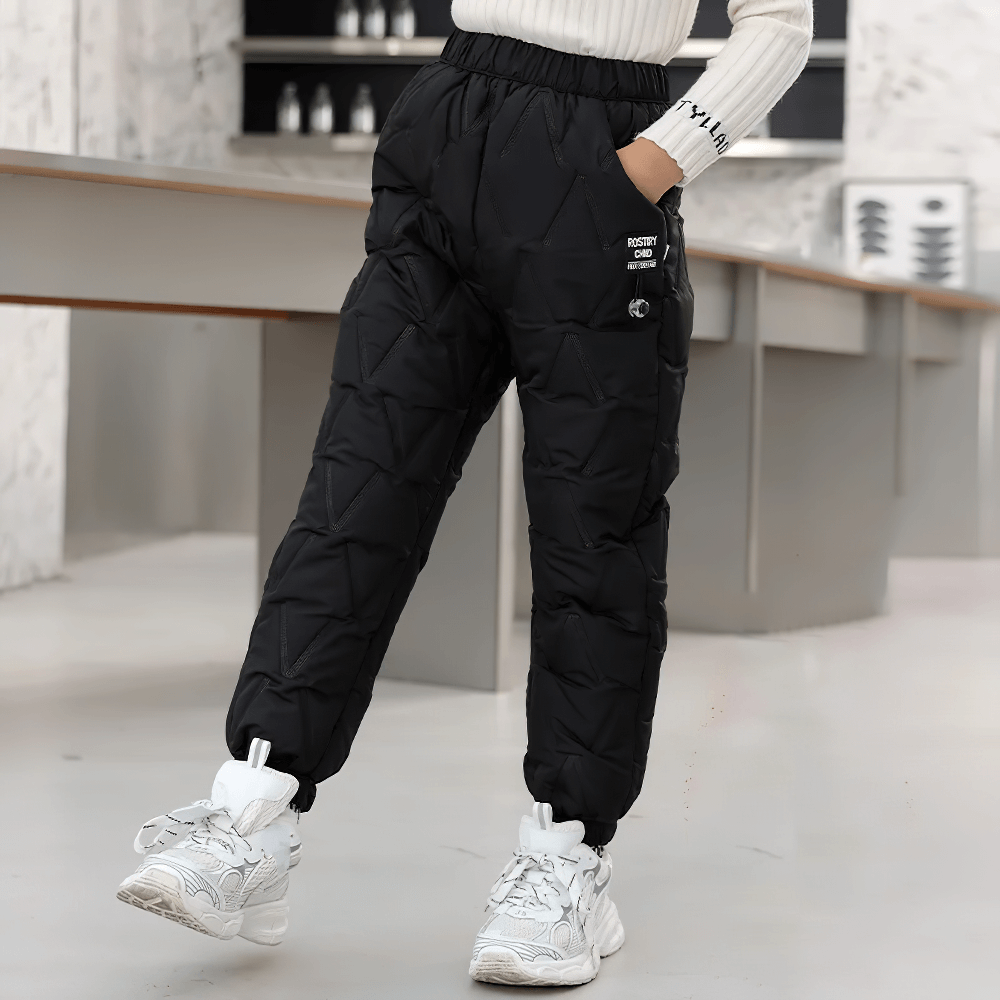 Child wearing Down Pants Warm Padded Ski and Snow Trousers - SF3733, perfect for winter sports and outdoor play.