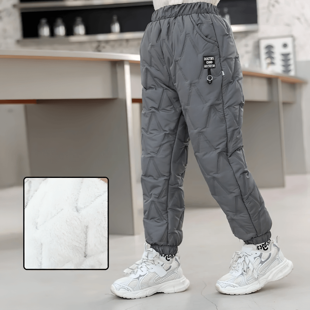 Child wearing Down Pants Warm Padded Ski and Snow Trousers - SF3733, insulated for winter, with thick padding and soft lining for warmth.