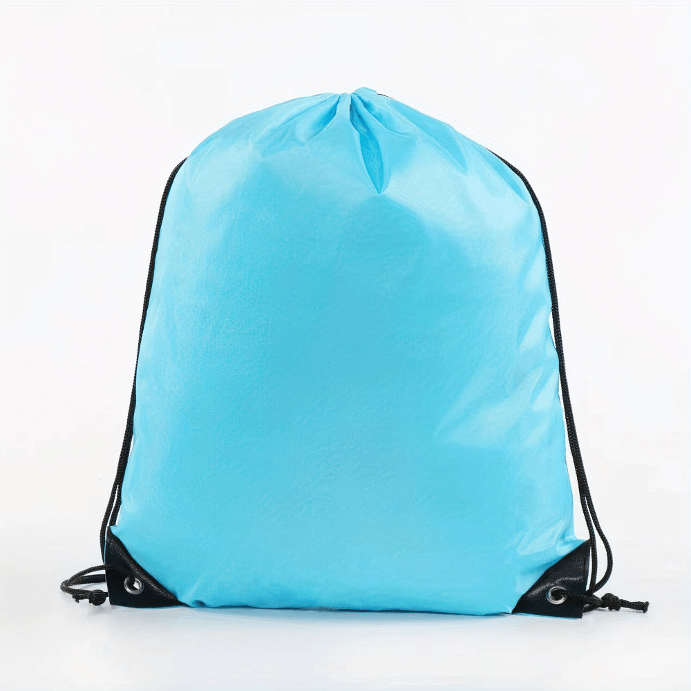 Blue drawstring nylon bag for gym and travel, ideal for sports, yoga, outdoor activities, with durable polyester and tape closure.