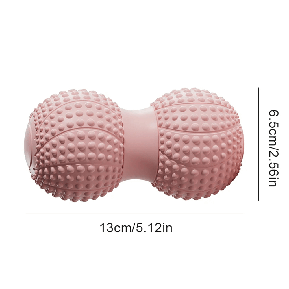 Pink dual-sided massage roller with textured surface for muscle relaxation, measuring 13cm x 6.5cm.