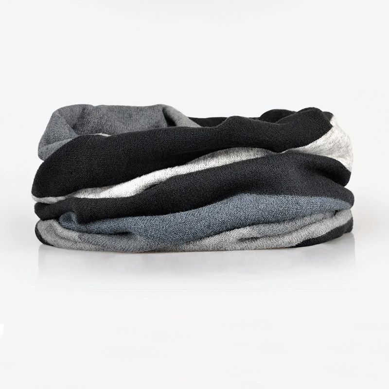 Stylish dual-use women's beanie with black, grey, and white stripes, made from soft polyester. Perfect for a chic and warm outfit upgrade.