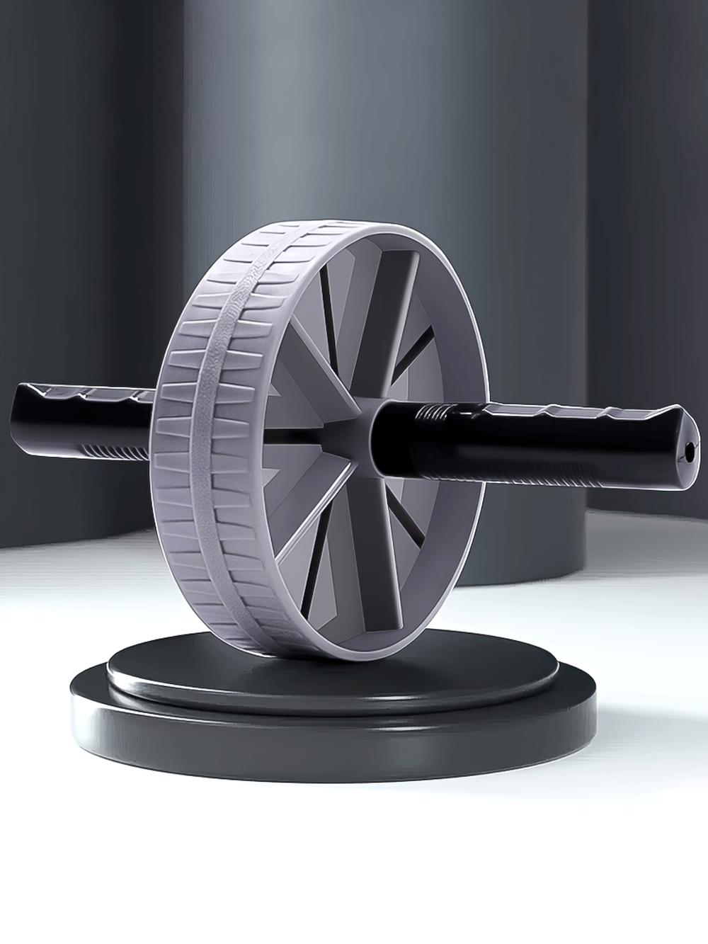 Sleek gray and black ab roller wheel with ergonomic handles, designed for effective home and gym workouts targeting core strength.