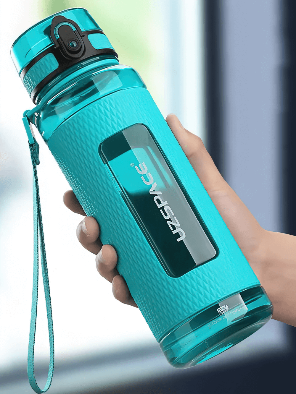 Durable leak-proof sports water bottle with handle, BPA-free Tritan, one-handed open feature, ideal for outdoor activities.