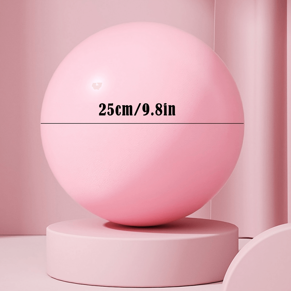 Durable pink Pilates sphere, 25cm size, ideal for versatile workouts, yoga, and stability training. Anti-burst design ensures safety.