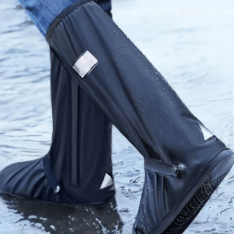 Person wearing Durable Slip-Resistant Waterproof Shoe Covers SF2194 on wet surface, showcasing protection against rain and snow.