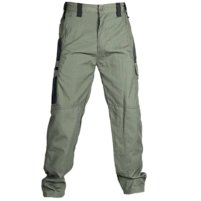 Green durable trekking trousers with multiple pockets, reinforced knees, and tactical cargo design, perfect for hiking and outdoor work.