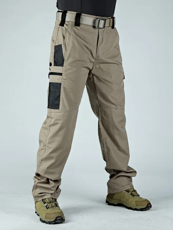 Durable trekking trousers SF2061 with multi-pockets, perfect for hiking. Lightweight, reinforced, ideal for outdoor adventures.