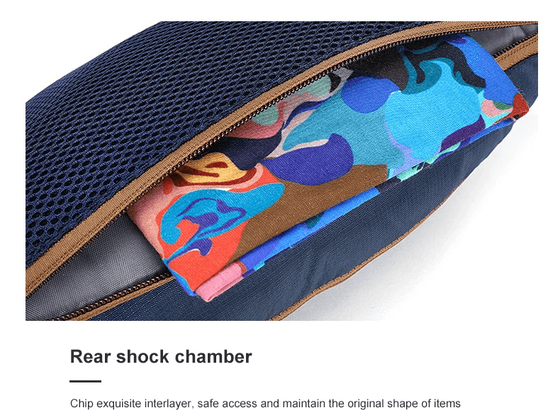 Close-up of water-resistant waist bag's rear shock chamber with colorful fabric inside, showcasing its secure and durable interior design.