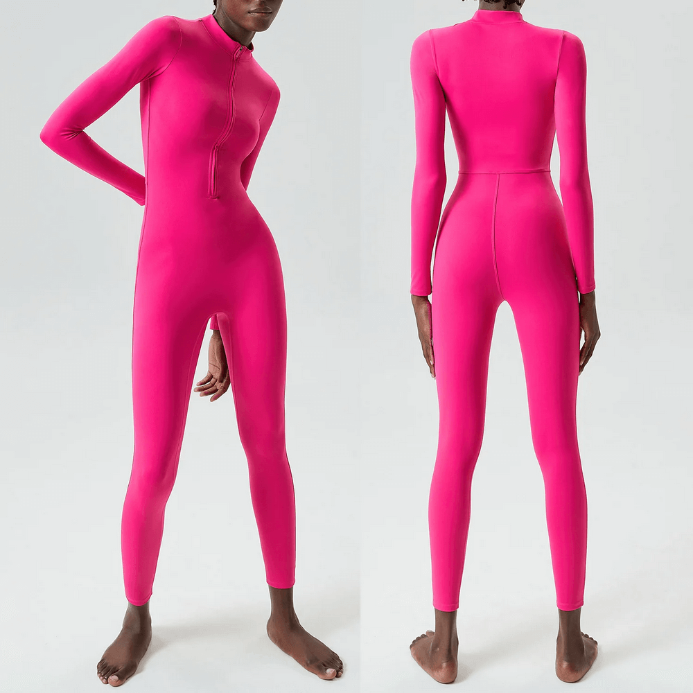 Vibrant pink zip-front jumpsuit for yoga and gym, crafted from snug nylon and lycra. Perfect for active wear and seamless movement.