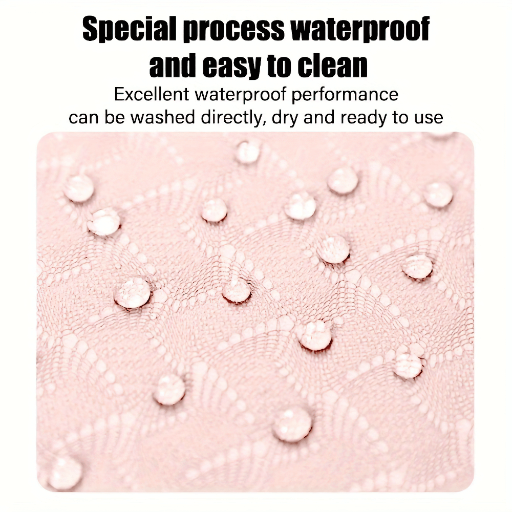 Close-up of a pink waterproof yoga mat surface with water droplets showcasing its easy-to-clean design and non-slip texture.