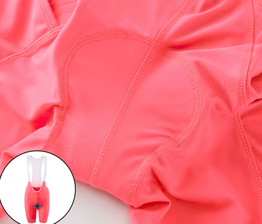 Fluorescent pink women's cycling bib shorts, breathable and stretchy for pro-fit performance