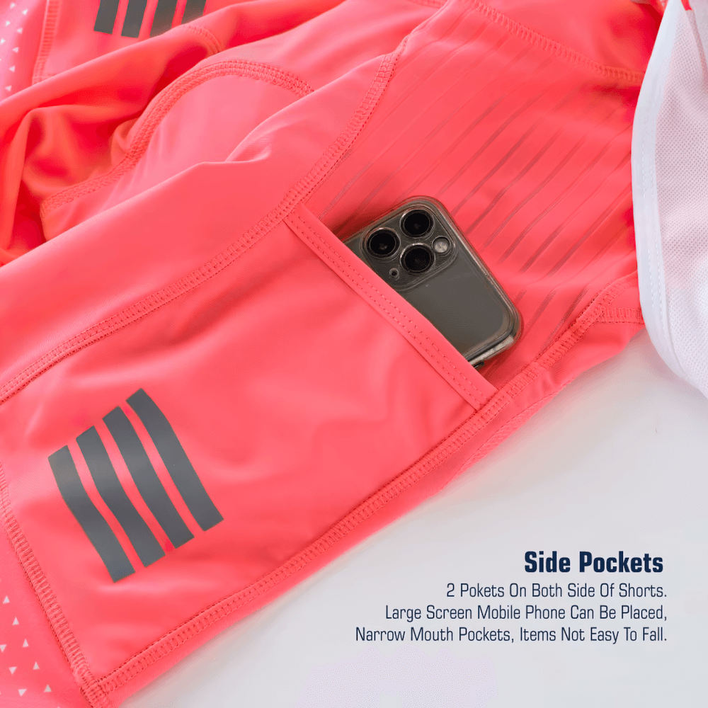 Close-up of fluorescent women's cycling bib shorts showing a pocket with a phone inside, highlighting side pocket feature.