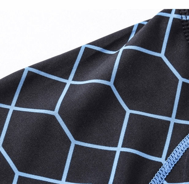 Close-up of blue geometric pattern on Elastic Compression Men's Fitness T-Shirt with breathable polyester-spandex fabric.