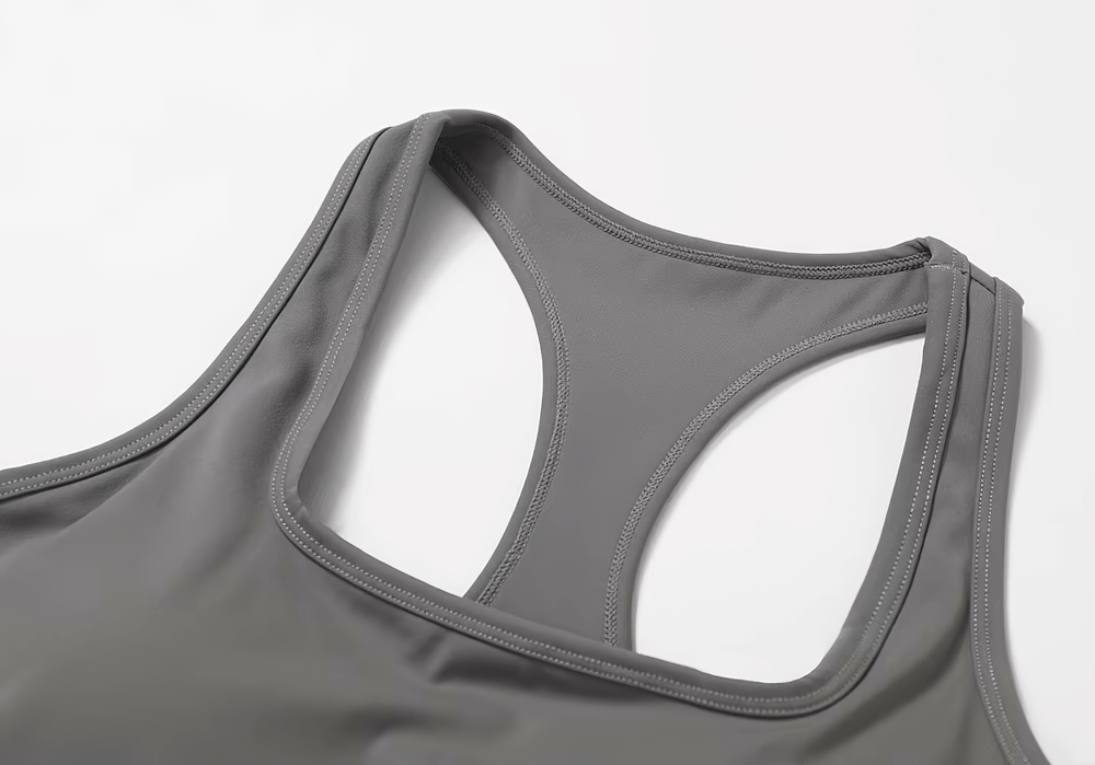 Gray quick-dry tank top with sleeveless design for women, perfect for fitness and running. Breathable nylon and spandex blend.