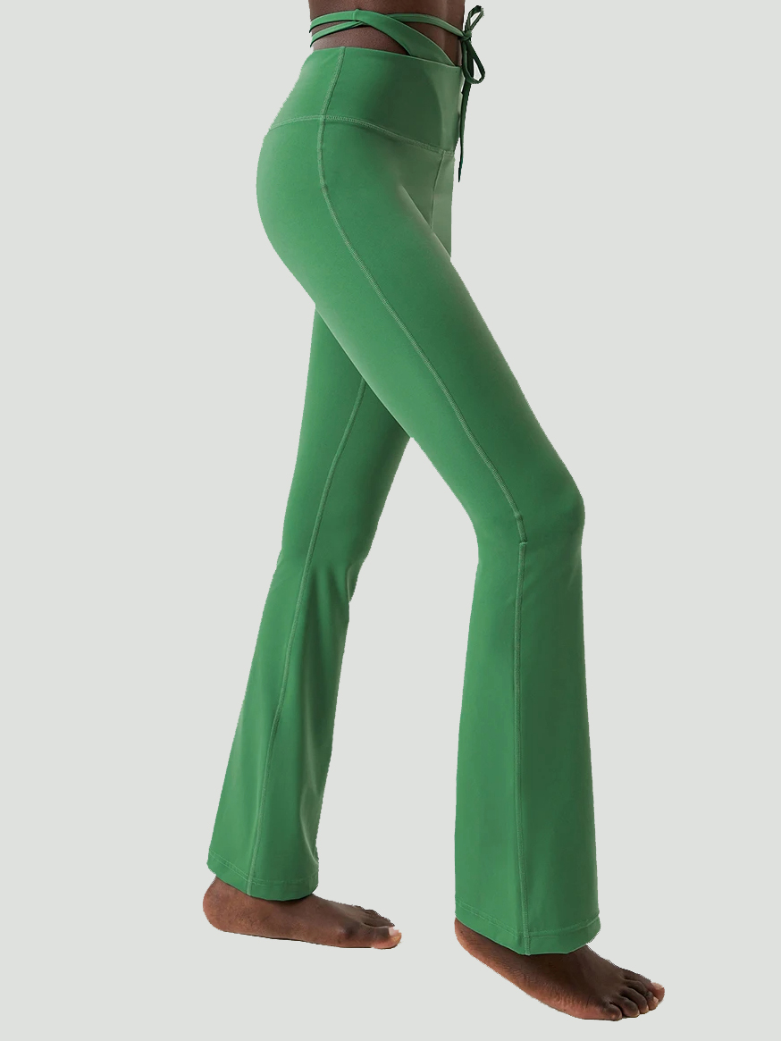 Stylish emerald flare yoga pants with tie-up detail, perfect for fashion-forward fitness enthusiasts. SF2093.