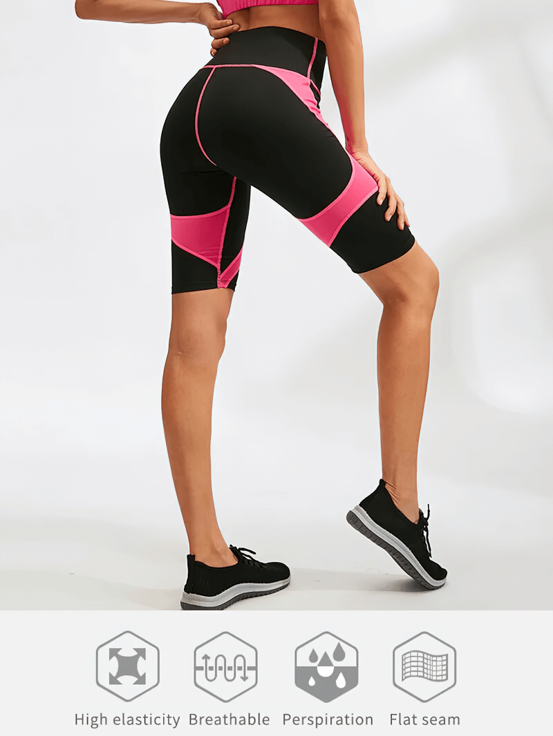 Elastic high-waisted patchwork sports shorts for women in black and pink, showcasing comfort and style.