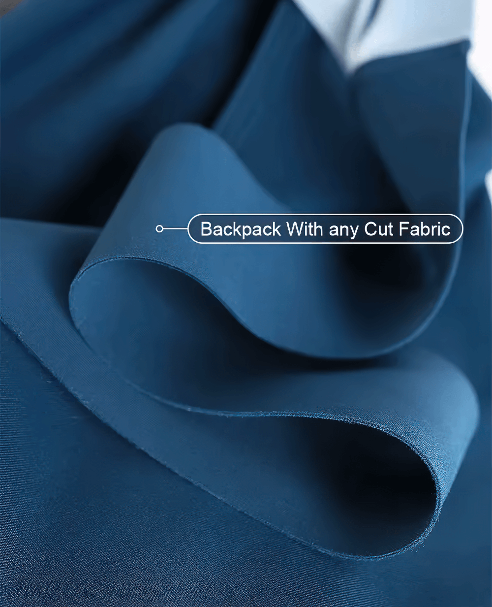 Close-up view of smooth blue fabric labeled 'Backpack With any Cut Fabric' emphasizing flexibility and style.